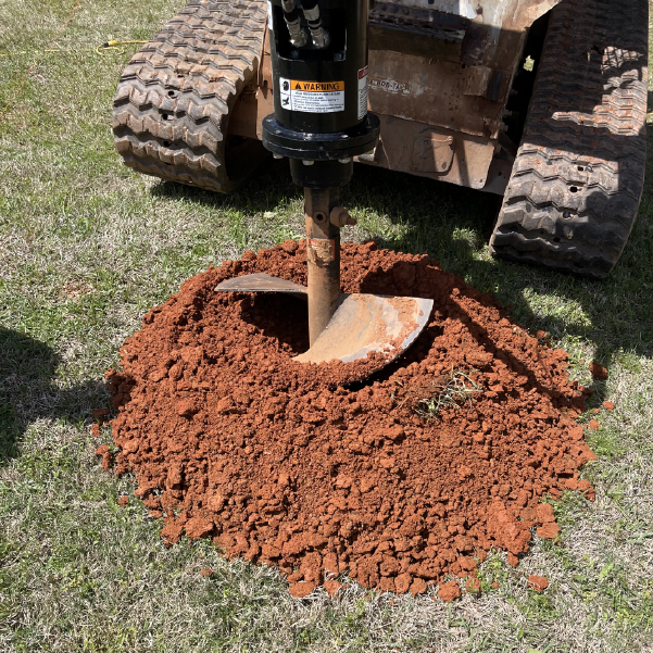 Before installation, drilling at frostline depth is important to prevent pole barn mistakes.