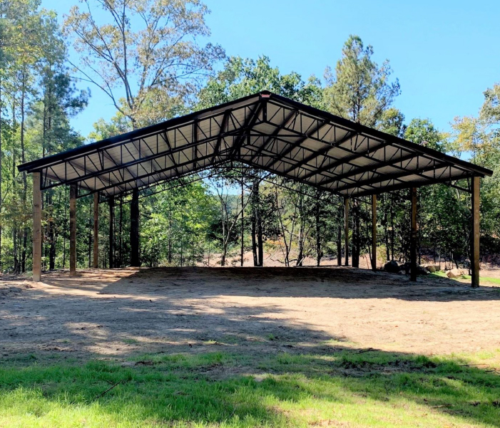 pole barn build This pole barn build is an open air post frame structure that will be used to cover large farm equipment